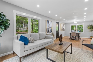 Nestled on a quiet dead-end street, this beautifully updated on Bolduc Park Golf Course in New Hampshire - for sale on GolfHomes.com, golf home, golf lot