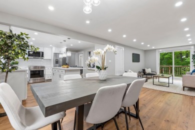Nestled on a quiet dead-end street, this beautifully updated on Bolduc Park Golf Course in New Hampshire - for sale on GolfHomes.com, golf home, golf lot