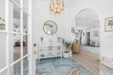 Stunning and tastefully updated home seated on an oversized lot on Rotonda Golf and Country Club - Long Marsh  in Florida - for sale on GolfHomes.com, golf home, golf lot