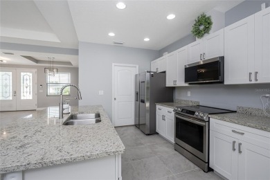 THIS *BETTER THAN NEW HOME* has been meticulously maintained and on Rotonda Golf and Country Club - Long Marsh  in Florida - for sale on GolfHomes.com, golf home, golf lot