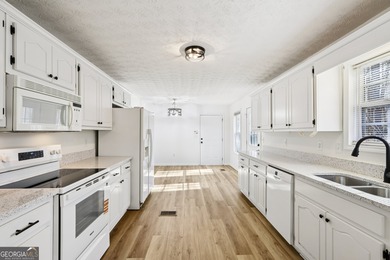 Welcome home to this cutie, updated 3-bedroom,2 bath home that on Turtle Cove Golf Course in Georgia - for sale on GolfHomes.com, golf home, golf lot