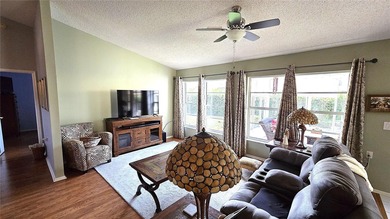 Enjoy maintenance-free living in this fully furnished 1,855 on Timber Greens Country Club in Florida - for sale on GolfHomes.com, golf home, golf lot