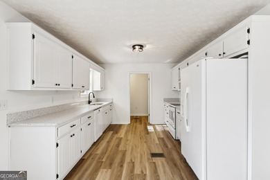 Welcome home to this cutie, updated 3-bedroom,2 bath home that on Turtle Cove Golf Course in Georgia - for sale on GolfHomes.com, golf home, golf lot