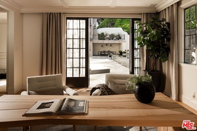 Some homes invite you in. Others take your breath away. 10950 on Bel-Air Country Club in California - for sale on GolfHomes.com, golf home, golf lot