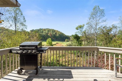 Tucked along the 8th hole of Apple Valley Golf Course, this on Rumbling Bald Resort on Lake Lure in North Carolina - for sale on GolfHomes.com, golf home, golf lot