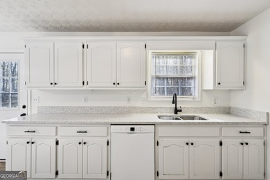 Welcome home to this cutie, updated 3-bedroom,2 bath home that on Turtle Cove Golf Course in Georgia - for sale on GolfHomes.com, golf home, golf lot