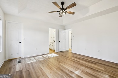 Welcome home to this cutie, updated 3-bedroom,2 bath home that on Turtle Cove Golf Course in Georgia - for sale on GolfHomes.com, golf home, golf lot