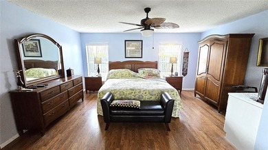 Enjoy maintenance-free living in this fully furnished 1,855 on Timber Greens Country Club in Florida - for sale on GolfHomes.com, golf home, golf lot