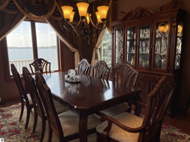 Beautiful waterfront house on Lake Isabella, an 800-acre on The Pines Golf Course at Lake Isabella in Michigan - for sale on GolfHomes.com, golf home, golf lot