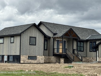 Beautiful and spacious custom home currently under construction on Teton Reserve in Idaho - for sale on GolfHomes.com, golf home, golf lot