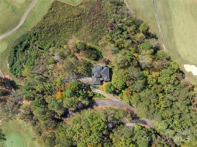 Tucked along the 8th hole of Apple Valley Golf Course, this on Rumbling Bald Resort on Lake Lure in North Carolina - for sale on GolfHomes.com, golf home, golf lot