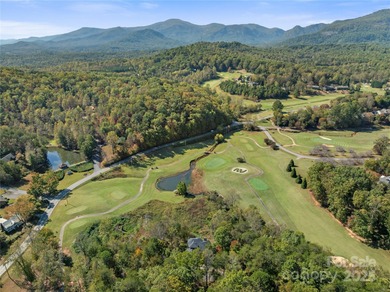 Tucked along the 8th hole of Apple Valley Golf Course, this on Rumbling Bald Resort on Lake Lure in North Carolina - for sale on GolfHomes.com, golf home, golf lot