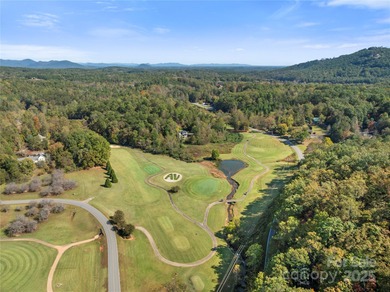 Tucked along the 8th hole of Apple Valley Golf Course, this on Rumbling Bald Resort on Lake Lure in North Carolina - for sale on GolfHomes.com, golf home, golf lot