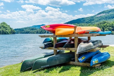 Tucked along the 8th hole of Apple Valley Golf Course, this on Rumbling Bald Resort on Lake Lure in North Carolina - for sale on GolfHomes.com, golf home, golf lot