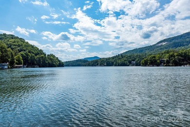 Tucked along the 8th hole of Apple Valley Golf Course, this on Rumbling Bald Resort on Lake Lure in North Carolina - for sale on GolfHomes.com, golf home, golf lot