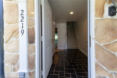 Highly desirable North Hudson condominium overlooking the 10th on The Country Club of Hudson in Ohio - for sale on GolfHomes.com, golf home, golf lot