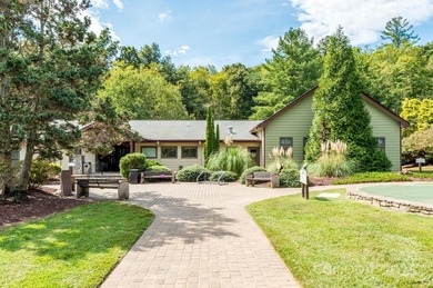 Tucked along the 8th hole of Apple Valley Golf Course, this on Rumbling Bald Resort on Lake Lure in North Carolina - for sale on GolfHomes.com, golf home, golf lot