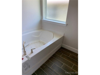 SELLER PROMO ON THIS POPULAR 1970 PLAN ON THE GOLF COURSE!! THIS on Twisted Oaks Golf Club in Florida - for sale on GolfHomes.com, golf home, golf lot