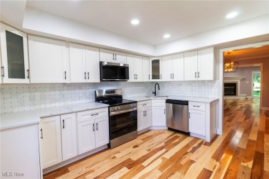 Highly desirable North Hudson condominium overlooking the 10th on The Country Club of Hudson in Ohio - for sale on GolfHomes.com, golf home, golf lot