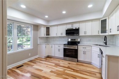 Highly desirable North Hudson condominium overlooking the 10th on The Country Club of Hudson in Ohio - for sale on GolfHomes.com, golf home, golf lot