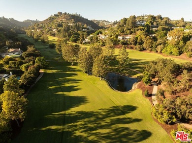 Some homes invite you in. Others take your breath away. 10950 on Bel-Air Country Club in California - for sale on GolfHomes.com, golf home, golf lot