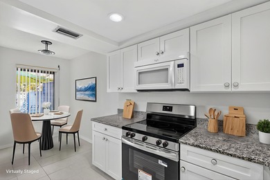 Beautiful Lake and Golf views from your living room! Step into on Heritage Ridge Golf Club in Florida - for sale on GolfHomes.com, golf home, golf lot