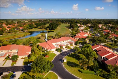 Set along the picturesque fairways of PGA National, this on PGA National Golf Club in Florida - for sale on GolfHomes.com, golf home, golf lot