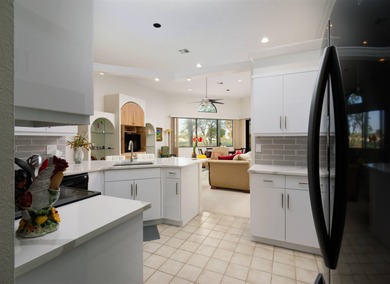 Set along the picturesque fairways of PGA National, this on PGA National Golf Club in Florida - for sale on GolfHomes.com, golf home, golf lot