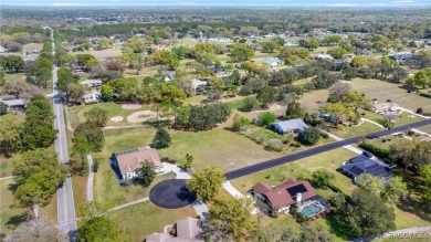 Want to watch the golfers play or enjoy the gorgeous Oak Trees? on Citrus Hills Golf Club in Florida - for sale on GolfHomes.com, golf home, golf lot