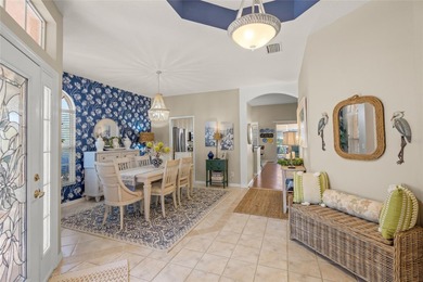 Under contract-accepting backup offers. Step into this on Pelican Pointe Golf and Country Club in Florida - for sale on GolfHomes.com, golf home, golf lot