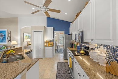 Under contract-accepting backup offers. Step into this on Pelican Pointe Golf and Country Club in Florida - for sale on GolfHomes.com, golf home, golf lot