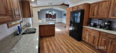 LOCATION, LOCATION, LOCATION.  This home has a brand new hickory on Miles City Town and Country Club in Montana - for sale on GolfHomes.com, golf home, golf lot