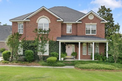 Full of charm and nestled in a quiet cul-de-sac, this 4-bedroom on West Lake Country Club in Georgia - for sale on GolfHomes.com, golf home, golf lot