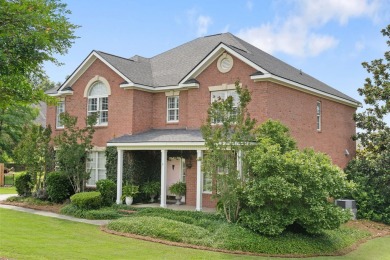 Full of charm and nestled in a quiet cul-de-sac, this 4-bedroom on West Lake Country Club in Georgia - for sale on GolfHomes.com, golf home, golf lot