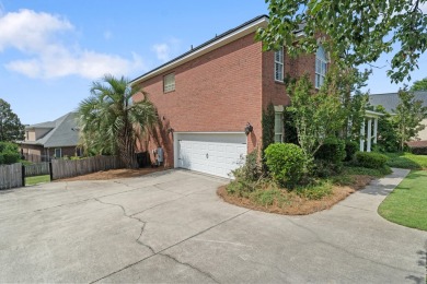 Full of charm and nestled in a quiet cul-de-sac, this 4-bedroom on West Lake Country Club in Georgia - for sale on GolfHomes.com, golf home, golf lot
