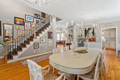 Full of charm and nestled in a quiet cul-de-sac, this 4-bedroom on West Lake Country Club in Georgia - for sale on GolfHomes.com, golf home, golf lot