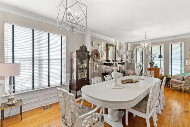 Full of charm and nestled in a quiet cul-de-sac, this 4-bedroom on West Lake Country Club in Georgia - for sale on GolfHomes.com, golf home, golf lot