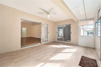 Enjoy the best of 55+ living in the gated Tampa Bay Golf & on Tampa Bay Golf and Country Club in Florida - for sale on GolfHomes.com, golf home, golf lot