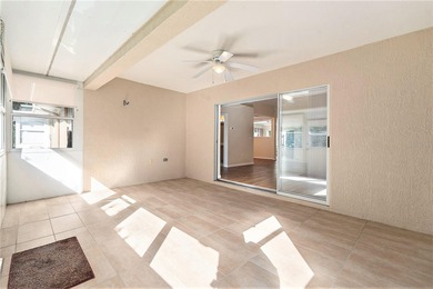 Enjoy the best of 55+ living in the gated Tampa Bay Golf & on Tampa Bay Golf and Country Club in Florida - for sale on GolfHomes.com, golf home, golf lot