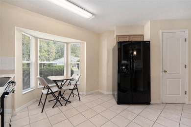 Enjoy the best of 55+ living in the gated Tampa Bay Golf & on Tampa Bay Golf and Country Club in Florida - for sale on GolfHomes.com, golf home, golf lot