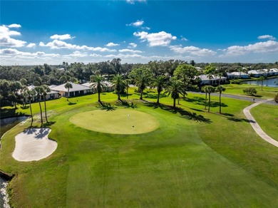Paradise found on the 16th hole . . . a home designed for those on Plantation Golf and Country Club in Florida - for sale on GolfHomes.com, golf home, golf lot
