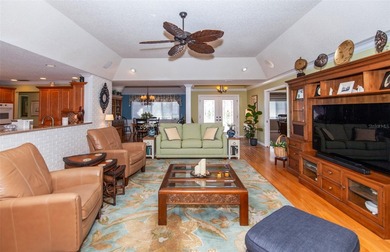 Paradise found on the 16th hole . . . a home designed for those on Plantation Golf and Country Club in Florida - for sale on GolfHomes.com, golf home, golf lot