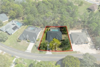 Tastefully renovated and meticulously maintained pool and spa on Sugarmill Woods Golf and Country Club in Florida - for sale on GolfHomes.com, golf home, golf lot