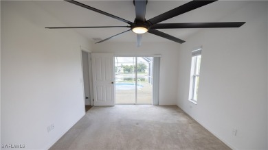 Waterfront Pool Home with Solar in exclusive Cape Coral! Welcome on El Rio Golf Course and Club in Florida - for sale on GolfHomes.com, golf home, golf lot