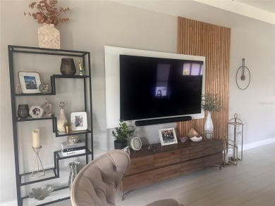 Discover the perfect blend of luxury and comfort in this on Lakewood National Golf Club in Florida - for sale on GolfHomes.com, golf home, golf lot