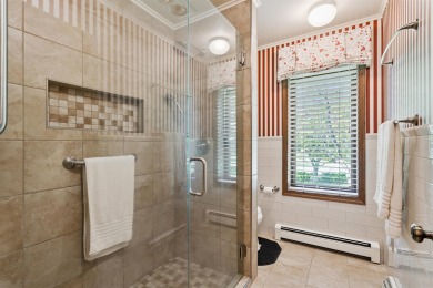 Step into timeless elegance with this beautifully crafted home on Waukon Golf and Country Club in Iowa - for sale on GolfHomes.com, golf home, golf lot