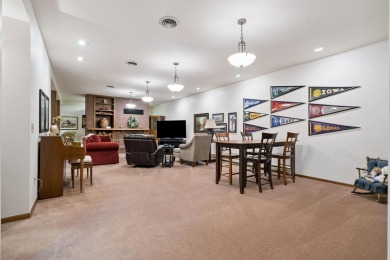 Step into timeless elegance with this beautifully crafted home on Waukon Golf and Country Club in Iowa - for sale on GolfHomes.com, golf home, golf lot