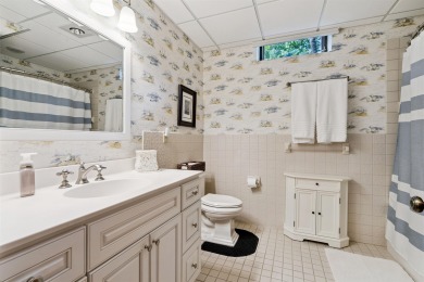 Step into timeless elegance with this beautifully crafted home on Waukon Golf and Country Club in Iowa - for sale on GolfHomes.com, golf home, golf lot