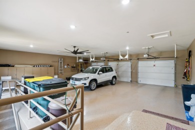 Step into timeless elegance with this beautifully crafted home on Waukon Golf and Country Club in Iowa - for sale on GolfHomes.com, golf home, golf lot