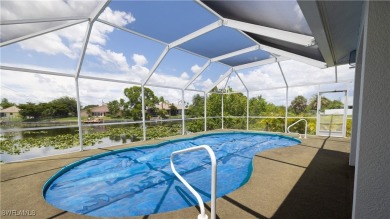 Waterfront Pool Home with Solar in exclusive Cape Coral! Welcome on El Rio Golf Course and Club in Florida - for sale on GolfHomes.com, golf home, golf lot